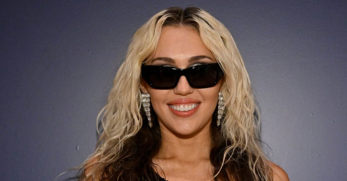 Miley Cyrus Flaunts Fit Figure In White Hot Swimsuit Black Slingback Heels Sports Illustrated