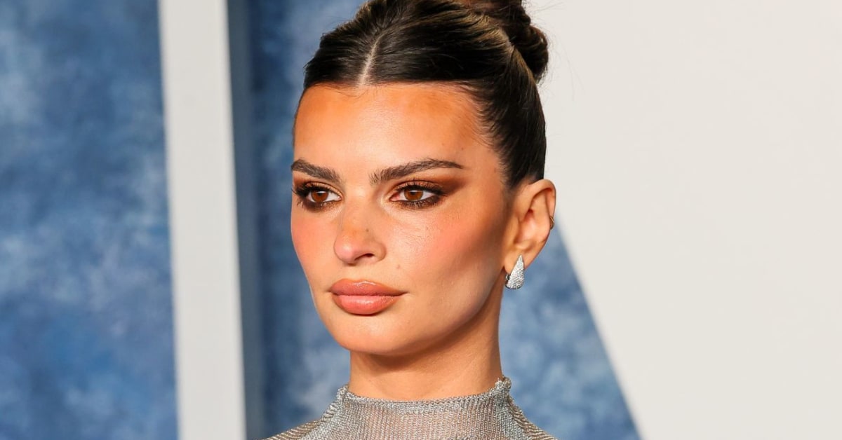 Model Emily Ratajkowski Is Fierce In Black Bikini And Fishnet Cover Up