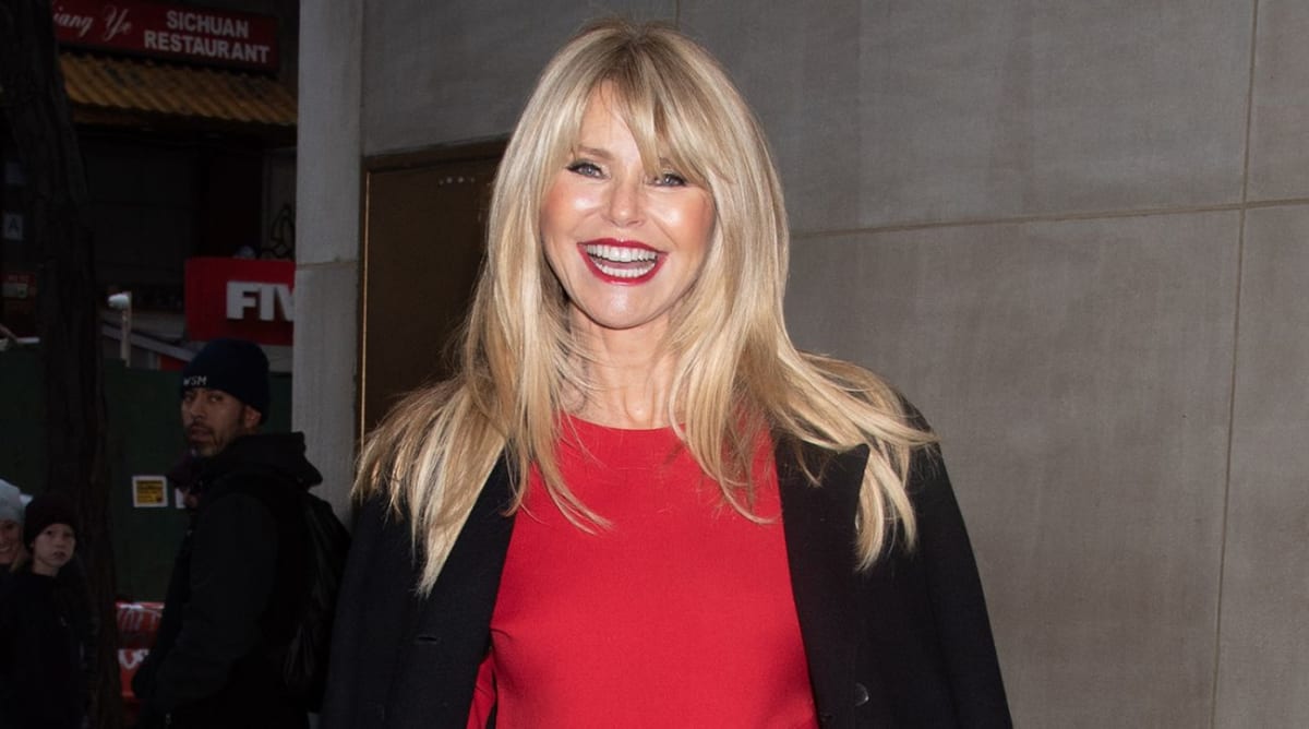 Christie Brinkley Looks Festive in a Red Dress and Sparkly Boots in New York City