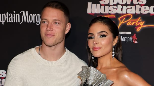 Christian McCaffrey and Olivia Culpo