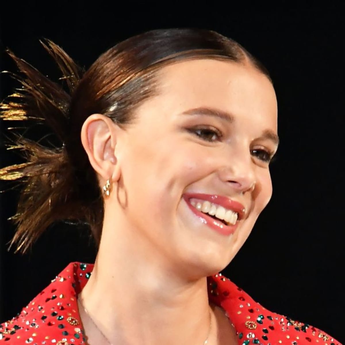 Millie Bobby Brown looks unreal in ribbed mini dress and killer boots