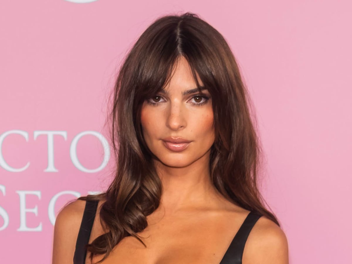 Emily Ratajkowski shares a kiss with husband Sebastian in New York