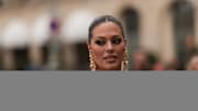 Ashley Graham wears a total Schiaparelli look during Paris Fashion Week.