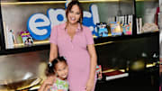 Luna and Chrissy Teigen pose together at an event in Hollywood. 