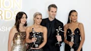 Muge Erdirik Dogan, Kim Kardashian, Jens Grede and Emma Grede pose with the Amazon Innovation Award during the CFDA Fashion Awards.