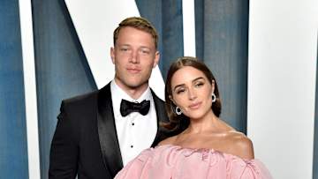 Olivia Culpo and Christian McCaffrey attend the 2022 Vanity Fair Oscar Party.