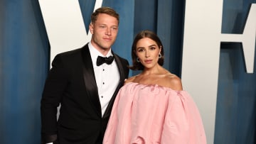 Christian McCaffrey and Olivia Culpo attend the 2022 Vanity Fair Oscar Party.