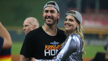 Justin Verlander and Kate Upton celebrate the 6-1 win over the Tampa Bay Rays in Game 5 of the American League Division Series. 