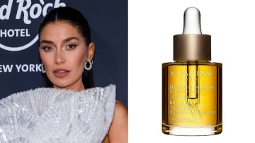 On the left, Nicole Williams English poses in a silver sequined dress with a high neck. On the right, there is a bottle of Clarins Blue Orchid Treatment Oil in front of a white backdrop.