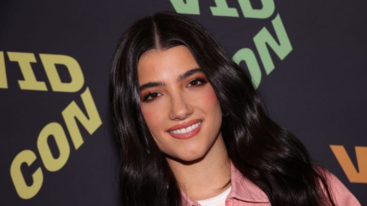 Charli D'Amelio attends 2022 VidCon at Anaheim Convention Center. Charli D'Amelio attends 2022 VidCon at Anaheim Convention Center.