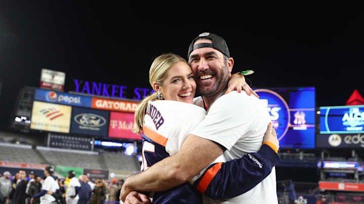 Astros pitcher Justin Verlander celebrates with his wife Kate Upton following Houston’s defeat of the New York Yankees.