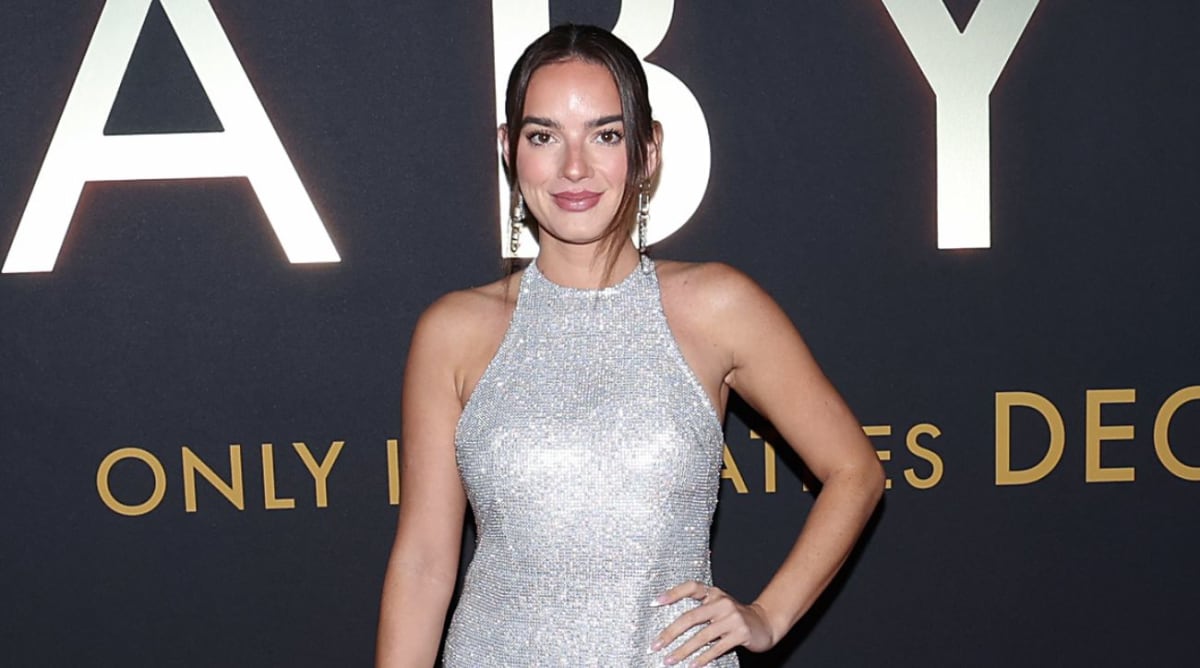 Natalie Mariduena Shimmers in a Silver Halter Dress on the Red Carpet