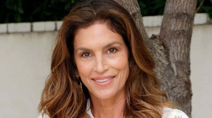 Cindy Crawford Lounging on an Outdoor Couch in a Bathrobe Is a Total ...