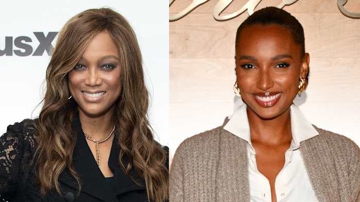 On the left, Tyra Banks poses in a black blazer with lace sleeves. On the right, Jasmine Tookes poses in a white button-down and tan cardigan.