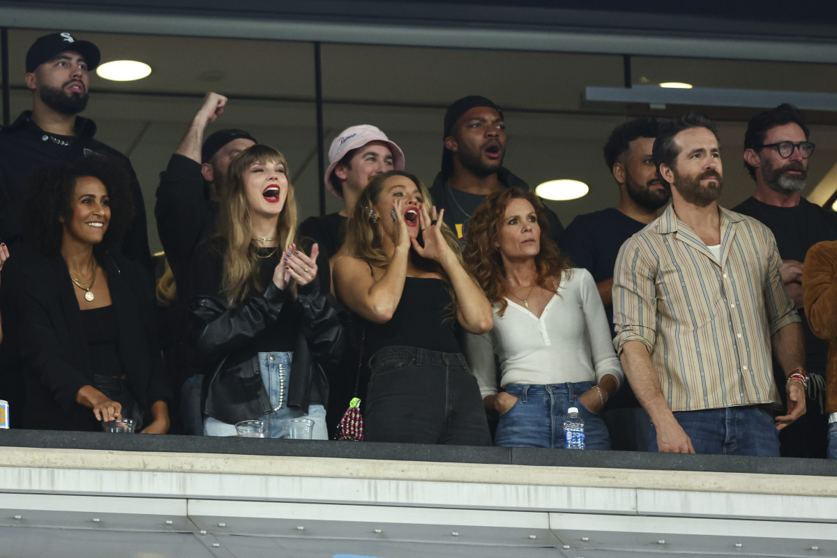 Taylor Swift, Blake Lively and Ryan Reynolds cheer on the Kansas City Chiefs during the Chiefs Jets game.